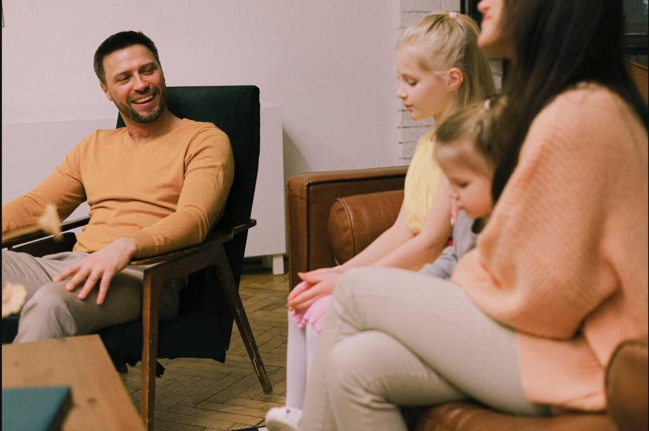 Family relaxing together in their living room